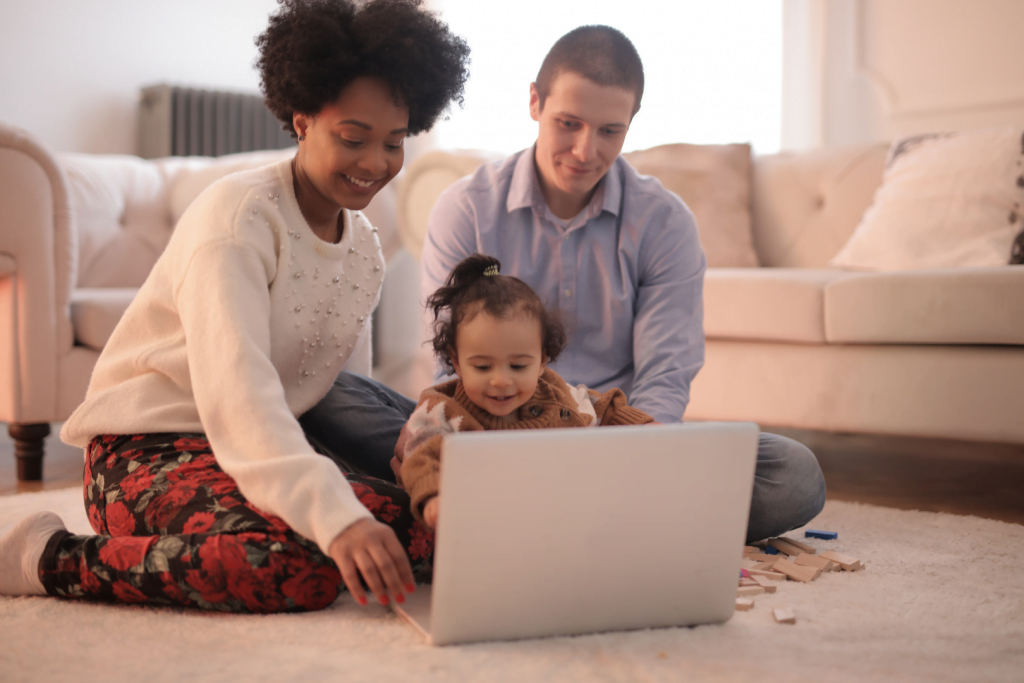 Young family on laptop